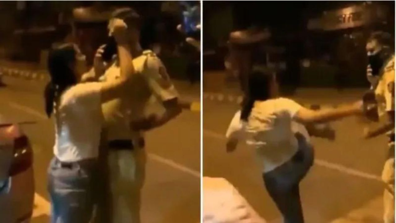 नशे में धुत लड़की ने बीच सड़क पर पुलिसकर्मी का कॉलर पकड़ मारी लात, गंदी गालियां देकर बीच सड़क पर ही लेटी- देखें Video