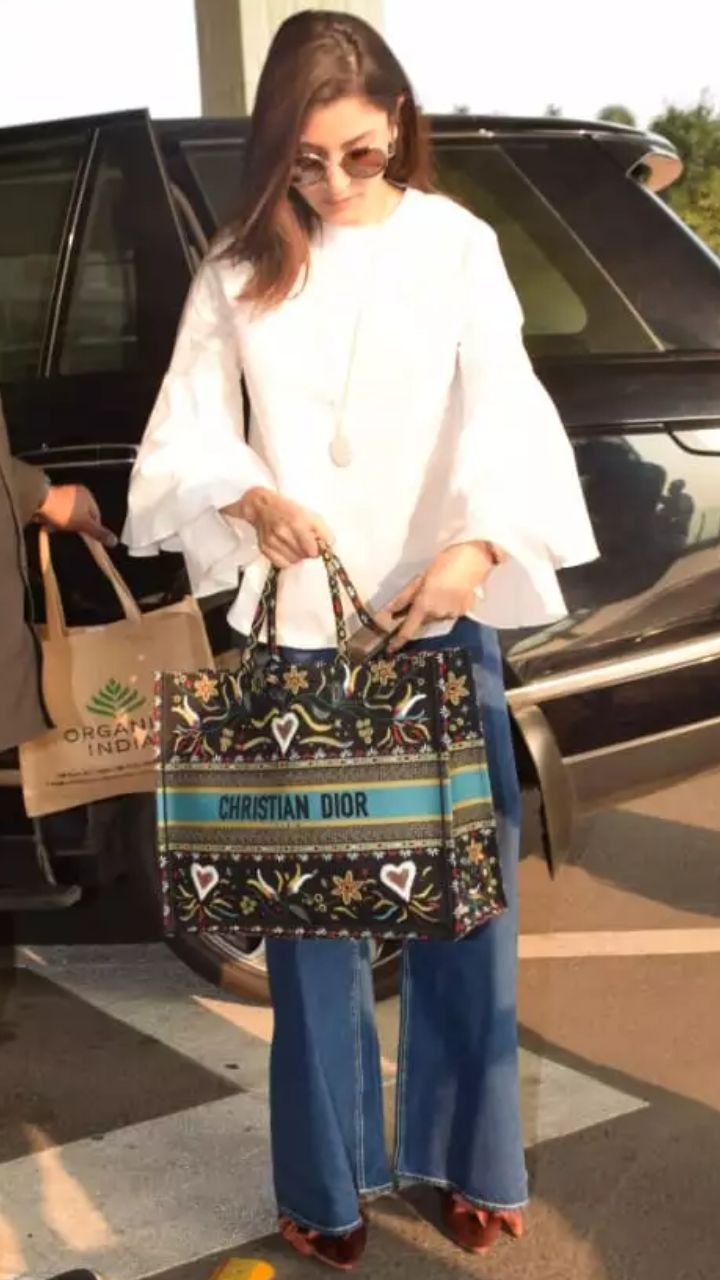 Anushka Sharma completes her Airport look with Christian Dior Bag