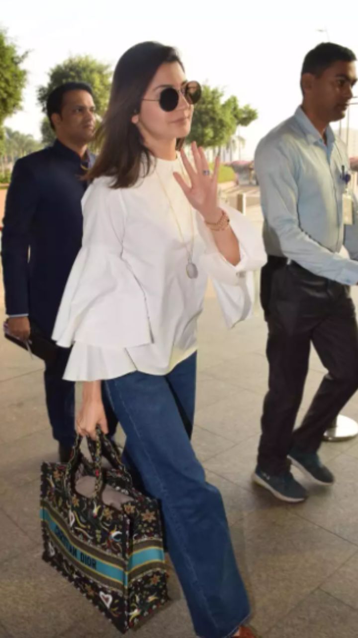 Anushka Sharma completes her Airport look with Christian Dior Bag