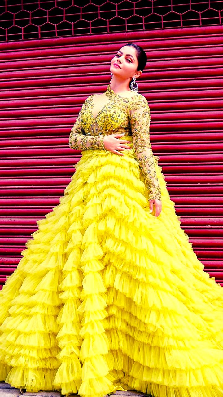 Yellow haldi dresss | Pleated gown, Haldi dress ideas, Haldi outfits