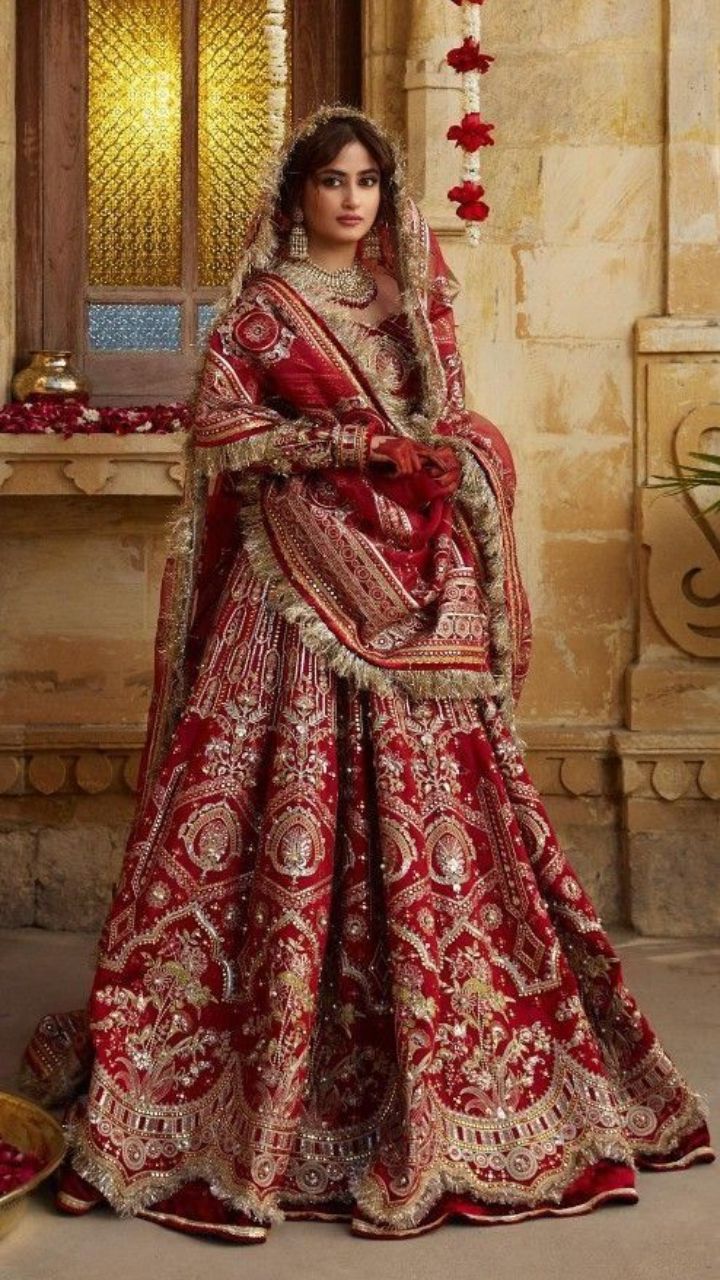 101 Red Bridal Lehenga Designs 2023 || Designer, Royal, With Few Prices -  Wedbook | Bridal lehenga red, Indian wedding dress designers, Bride groom  photoshoot